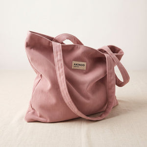 Totebag auf naturfarbenem Leinen